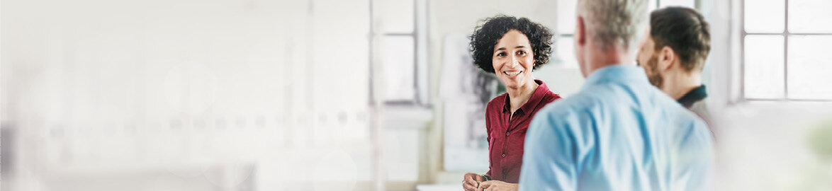 Woman talking with team 