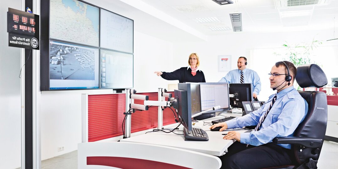  Three safety specialists coordinate alarm receiving station